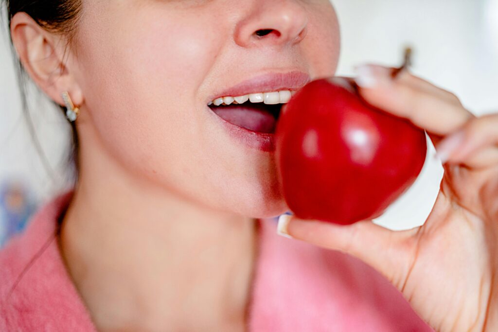 Dentist performing dental examination to check teeth and gum health