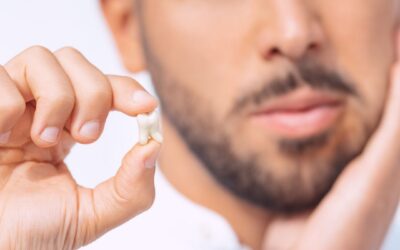 Dentist examining painful wisdom tooth for possible removal